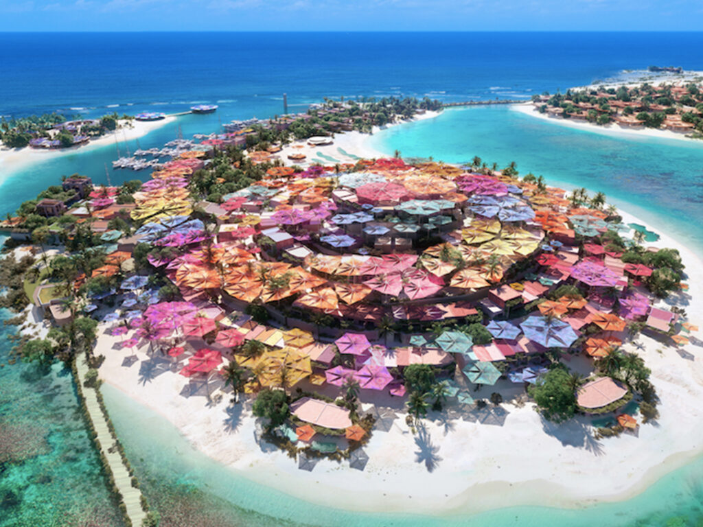 Miraval The Red Sea: Grand Hyatt The Red Sea: aerial view of colourful hotels surrounded by pristine blue beaches and sand in The Red Sea, Saudi Arabia