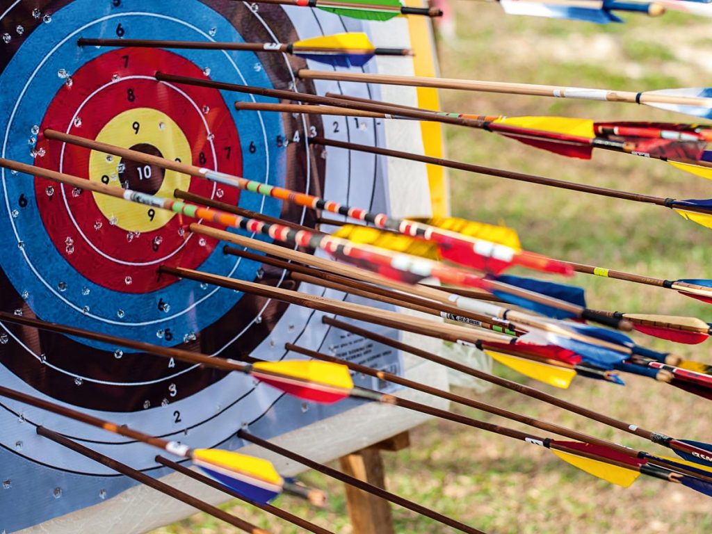 Things to do in Riyadh in May: Archery board with arrows