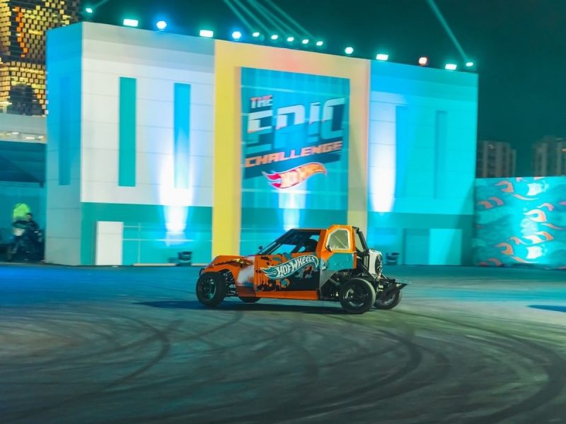 Jeddah Season Hot Wheels challenge: racing car on a track at night with blue lights