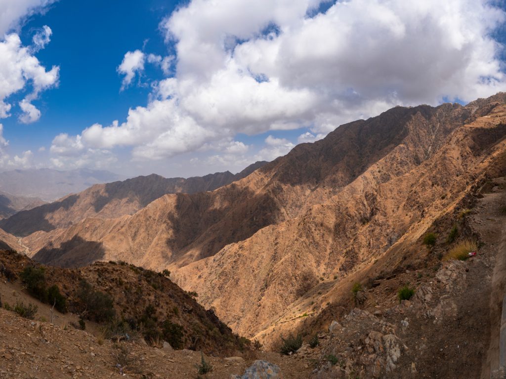 places to travel during Eid Al-Adha in Saudi Arabia: mountains with blue sky